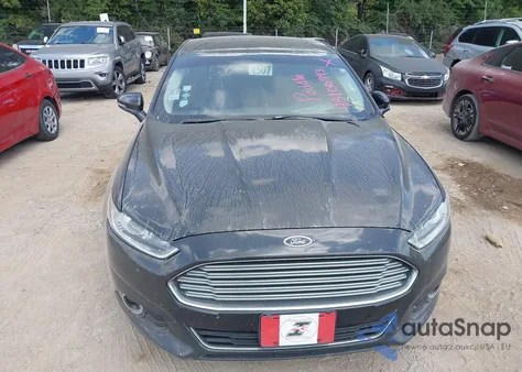 2014 Ford Fusion Hybrid Titanium z USA, uszkodzony, nr VIN 3FA6P0RU1ER289561